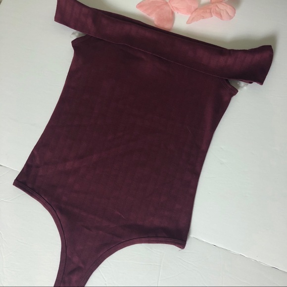 Rue21 Tops - RUE21 RED WINE BODYSUIT SIZE M